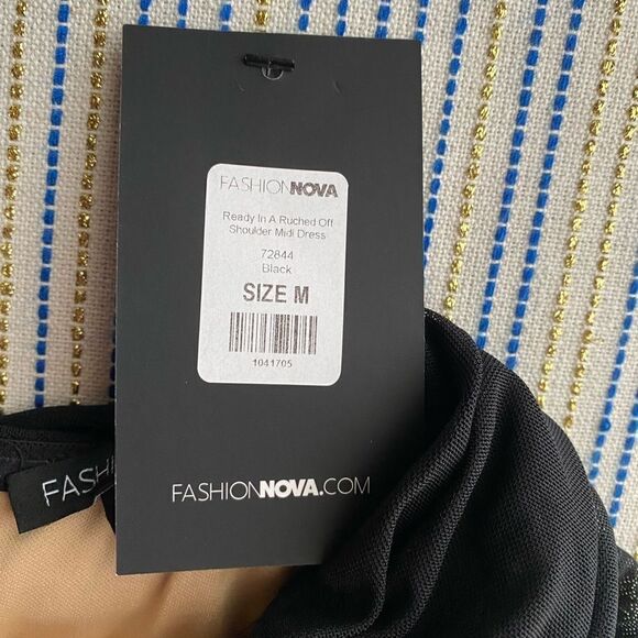 black dress with nude lining and closure on the back, new dress with tags - Picture 15 of 15